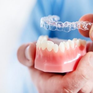 Straighten your teeth the invisible way with Invisalign